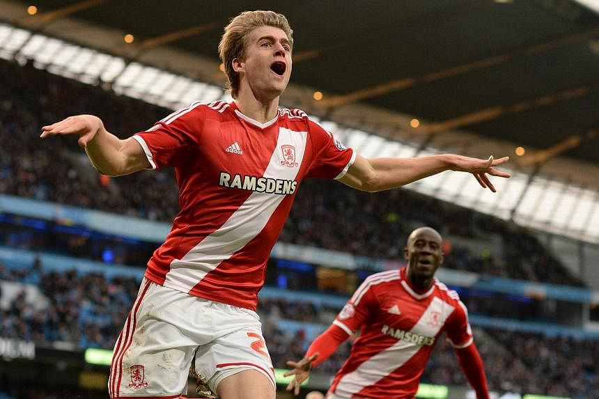Middlesbrough's Patrick Bamford celebrating scoring during the English FA Cup fourth round match between Manchester City and Middlesbrough at the Etihad Stadium in Manchester on Jan 24, 2015. Middlesbrough will face Arsenal after beating City to clai
