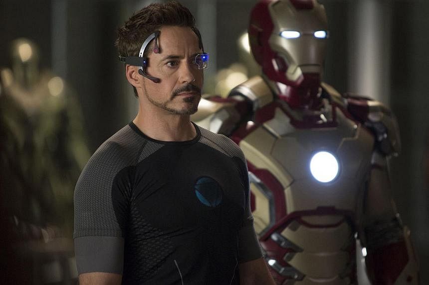 A cinema still from Marvel’s Iron Man 3, starring Robert Downey Jr as Tony Stark, who designs his armour by creating a virtual blueprint on his computer which he manipulates by projecting it in real-time display. -- PHOTO: WALT DISNEY CO&nbsp;