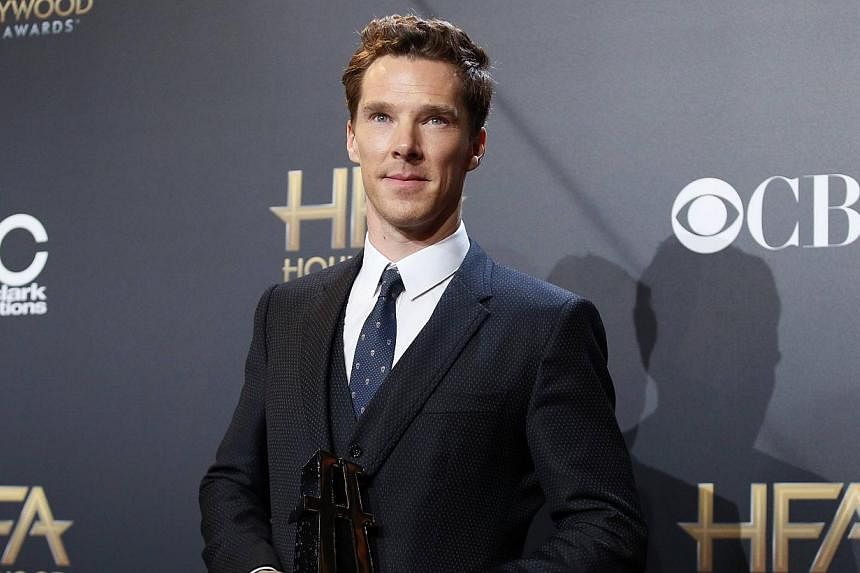 Actor Benedict Cumberbatch backstage with his actor award for The Imitation Game during the Hollywood Film Awards in Hollywood, California, on Nov 14, 2014. The actor has apologised for an offensive remark he made during an American TV interview. -- 