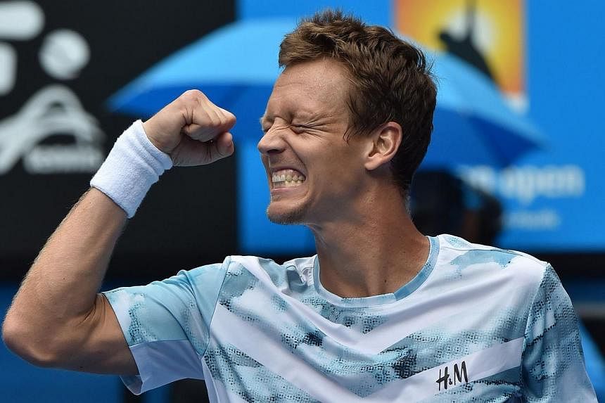 Czech Republic's Tomas Berdych celebrating after beating Spain's Rafael Nadal at the 2015 Australian Open in Melbourne on Jan 27, 2015. -- PHOTO: AFP&nbsp;