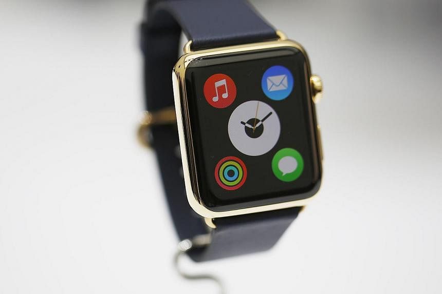 The new Apple Watch seen during an Apple event at the Flint Center for the Performing Arts in Cupertino, California, on Sep 9, 2014. The wearable devices, unveiled last year, are on track to begin shipping in April. -- PHOTO: REUTERS