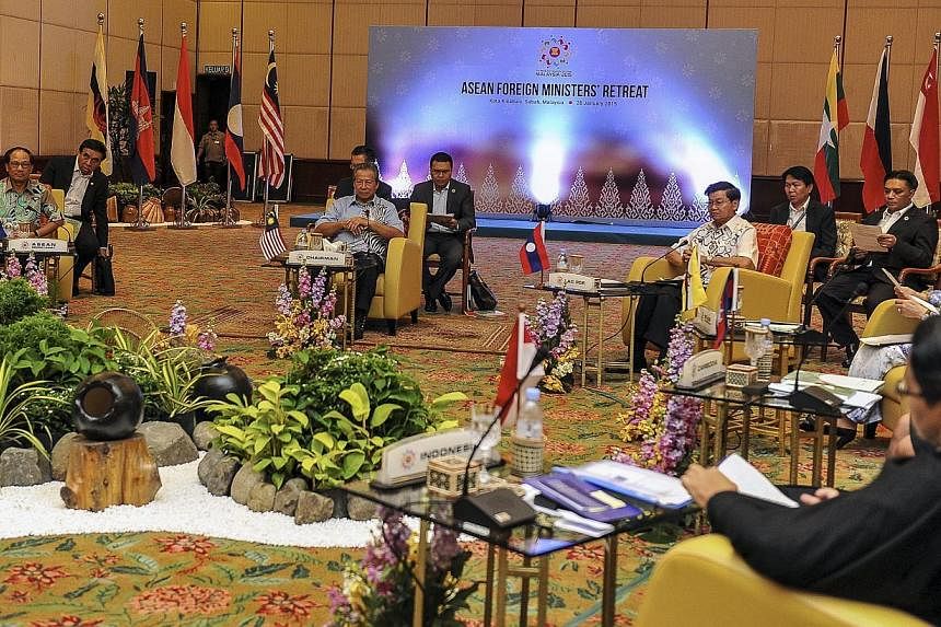 Malaysia Foreign Minister Anifah Aman (centre) speaks to ASEAN Foreign Ministers and delegates during ASEAN Foreign Ministers Retreat in Kota Kinabalu, Malaysia, Jan 28, 2015. Asean foreign ministers have condemned the violence and brutality committe