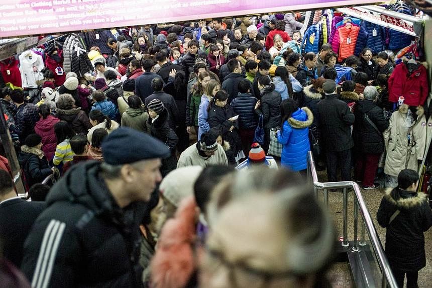The scene at Yashow Market in Beijing on Dec 18 last year. Less than one per cent of the total territory of East Asia is urbanised (close to the size of Cambodia), and only 36 per cent of the total population is urban - suggesting significant scope f