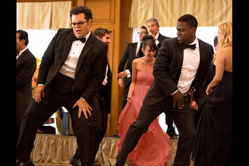 Josh Gad (left) is the friendless groom who meets a hustler best man for hire (Kevin Hart, right). -- PHOTO: SONY PICTURES
