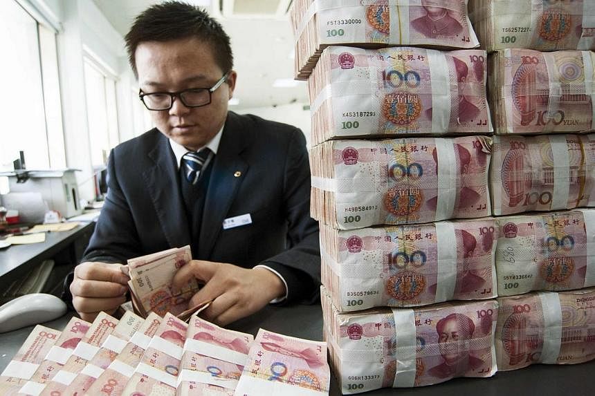 The yuan, also known as the renminbi (RMB), overtook the Canadian dollar and the Australian dollar to enter the top five of world payment currencies in November. -- PHOTO: REUTERS