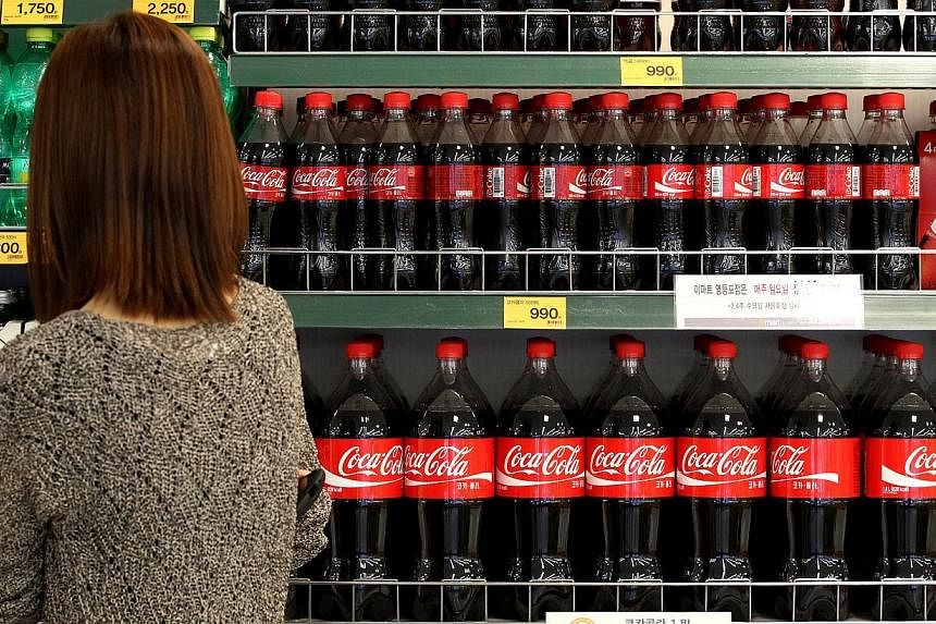 Girls who consume lots of sugary drinks start menstruating at a younger age, a study published in the journal Human Reproduction&nbsp;said on Wednesday, Jan 28, 2015. -- PHOTO: BLOOMBERG
