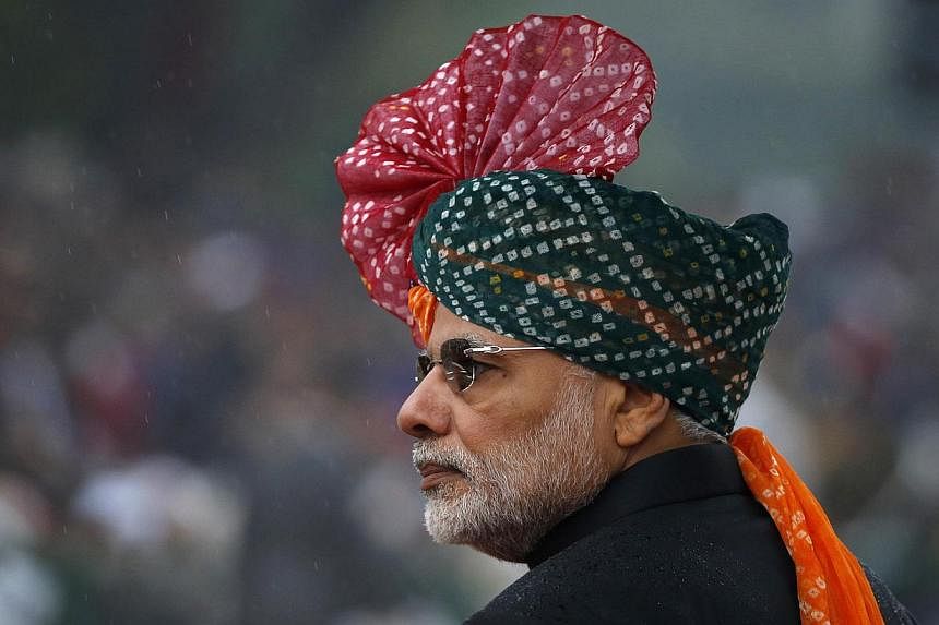 India's Prime Minister Narendra Modi attends India's Republic Day parade in New Delhi on Jan 26, 2015. -- PHOTO: REUTERS
