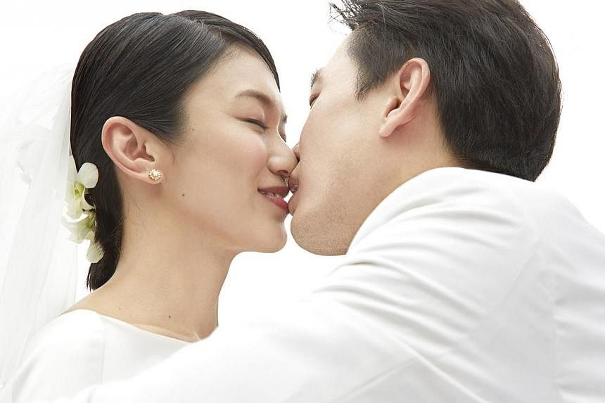 Local actor Qi Yuwu says he is still digesting the news of his actress wife Joanne Peh's pregnancy one month after they found out about it. -- PHOTO: MEDIACORP