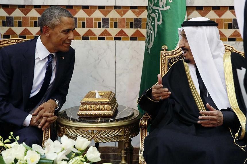 US President Barack Obama meets Saudi Arabia's King Salman (right) at Erga Palace in Riyadh, Jan 27, 2015. -- PHOTO: REUTERS