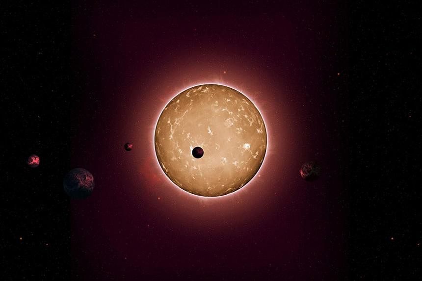 This artists rendering provided by Iowa State University in Ames, Iowa shows Kepler-444 a recently discovered star with at least five Earth-size planets. -- PHOTO: AFP&nbsp;