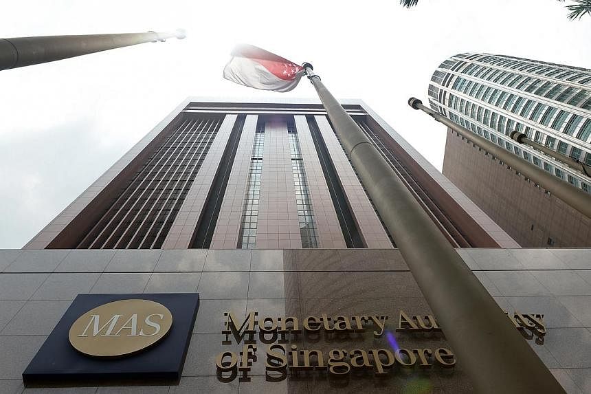 The three-month Singapore Interbank Offered Rate (Sibor) rose to 0.653 per cent on Wednesday, Jan 28, 2015, after the Monetary Authority of Singapore announced it would slow the appreciation of the Sing dollar. -- ST FILE PHOTO