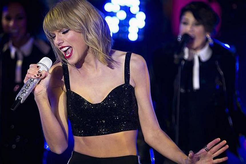 Pop star Taylor Swift (above) said her Twitter and Instagram accounts were hacked on Tuesday, but the rogue posts were quickly removed from the social media services. -- PHOTO: REUTERS