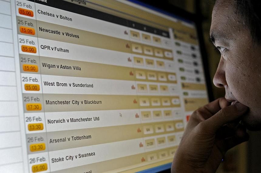 It is understood that the Ministry of Home Affairs has drawn up a list of online sites, including those for sports betting and casino games. Internet service providers will start blocking these sites from Feb 2. -- PHOTO: ST FILE