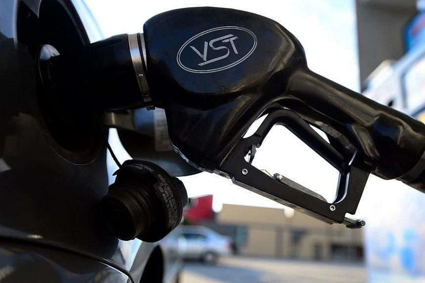 Oil tumbled to near a six-year low on Jan 28, 2015, as US crude stocks soared to a record high, sparking fresh fears over the growing global supply glut. -- PHOTO: AFP