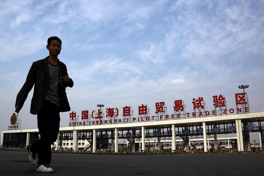 China plans to expand the use of some yuan policies - tested out in the Shanghai Free Trade Zone - to the rest of the country, the State Council said on Thursday, Jan 29, 2015. -- PHOTO: BLOOMBERG