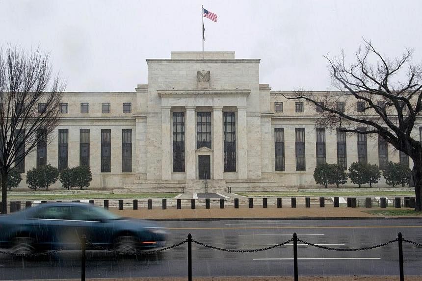 A 2013 file photo shows the US Federal Reserve in Washington, DC.&nbsp;The Federal Reserve on Wednesday said it would remain “patient” on raising ultra-low interest rates as the economy posts “solid” growth. -- PHOTO: AFP