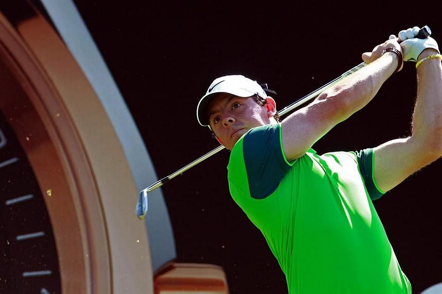 Rory McIlroy of Northern Ireland tees off during the first round of the Omega Dubai Desert Classic 2015 Golf tournament at Emirates Golf Club in Dubai, United Arab Emirates, on Jan 29, 2015. -- PHOTO: EPA