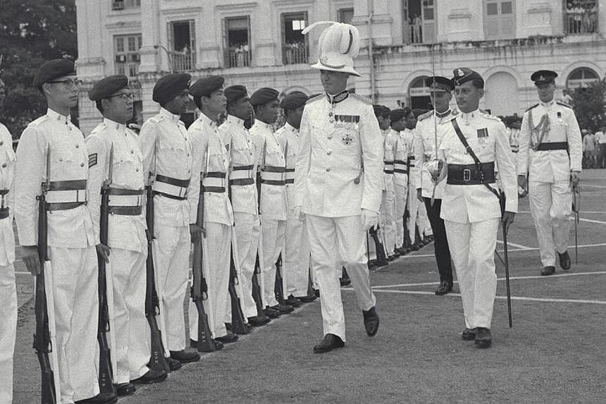 The new governor of Singapore, Sir William Goode, inspecting a guard of honour&nbsp;of the 1st Battalion Singapore Volunteer&nbsp;Corps during his installation ceremony, on Dec 11, 1957. The contributions of the Singapore Volunteer Corps will be cele