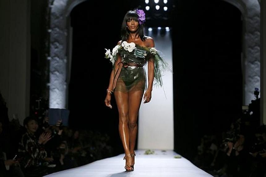 Model Naomi Campbell presents a creation by French designer Jean Paul Gaultier as part of his Haute Couture Spring Summer 2015 fashion show in Paris Jan 28, 2015. -- PHOTO: REUTERS