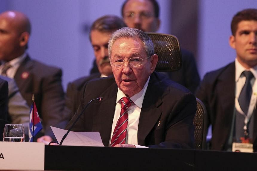 Cuban President Raul Castro (above) demanded on Wednesday an end to the US embargo against his country in order to make progress in talks to normalise relations. -- PHOTO: REUTERS