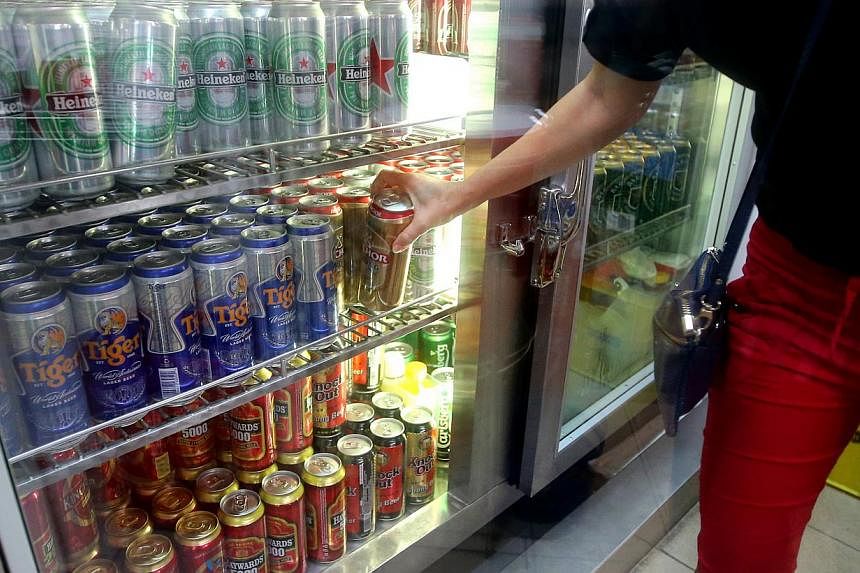 In Tekka market in Little India, beer can be sold only in tin cans - not bottles - during certain hours. --&nbsp;PHOTO: THE NEW PAPER FILE
