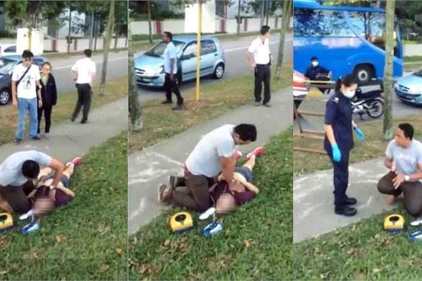 In this series of screengrabs from a video posted on Facebook by user Robin Sim, the off-duty paramedic checks for a pulse before performing CPR on the jogger. -- PHOTO: ROBIN SIM/FACEBOOK