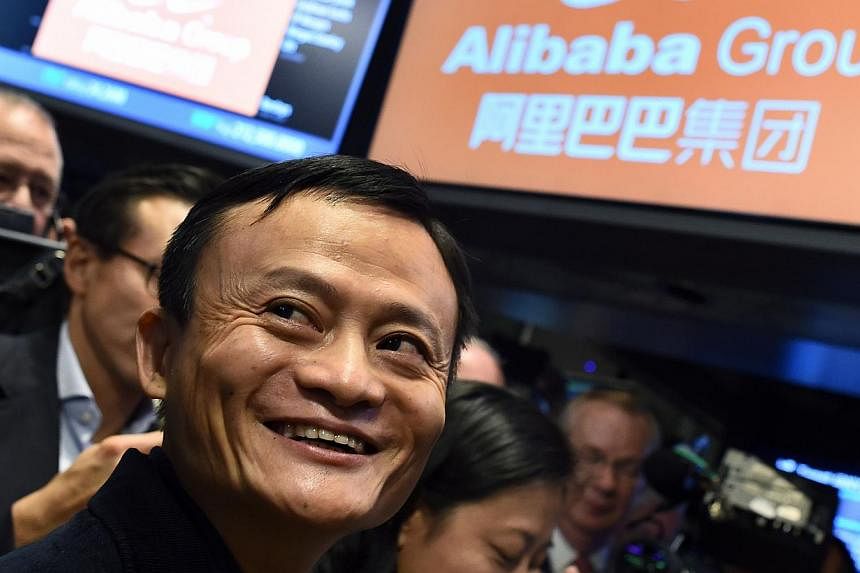 Alibaba founder Jack Ma waiting for trading to open at the New York Stock Exchange on Sept 19, 2014, the day the company was listed. -- PHOTO: AFP