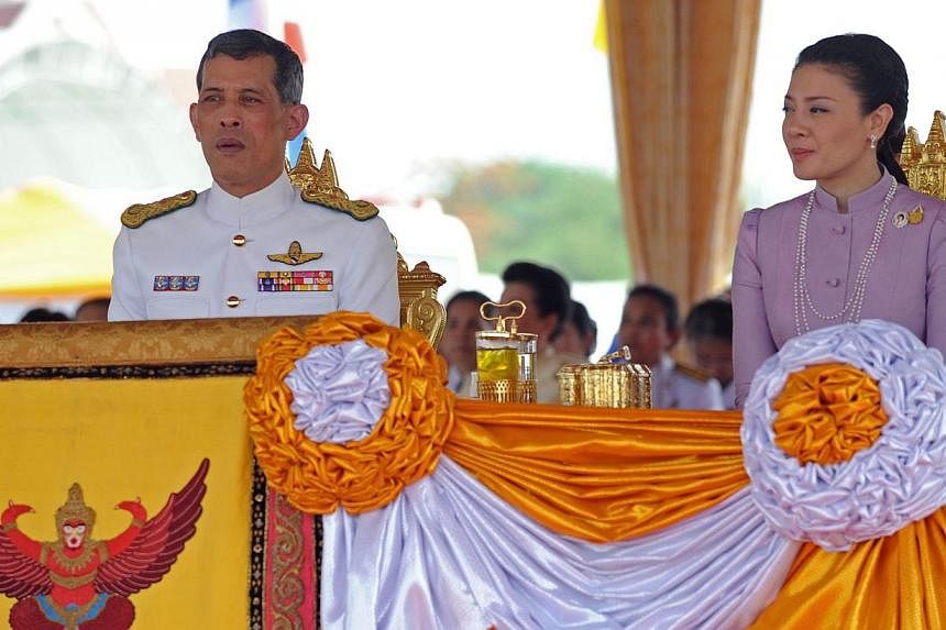 This file picture taken on May 13, 2010 shows Thai Crown Prince Maha Vajiralongkorn (left) and Princess Srirasmi (right) as they attend the annual Royal Ploughing Ceremony at Sanam Luang in Bangkok.&nbsp;Two senior Thai police officers allegedly at t