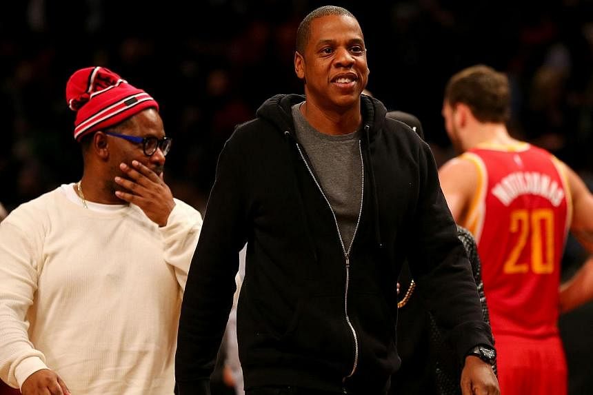 Jay Z is buying a Scandinavian music streaming company for US$56 million (S$76 million) to add to a business empire that has spanned clothing and sports bars. -- PHOTO: AFP
