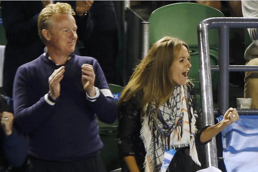 Kim Sears (right), fiancee of Andy Murray of Britain, celebrates after he defeated Tomas Berdych of Czech Republic in their men's singles semi-final match at the Australian Open 2015 tennis tournament in Melbourne on Jan 29, 2015.&nbsp;Andy Murray ha