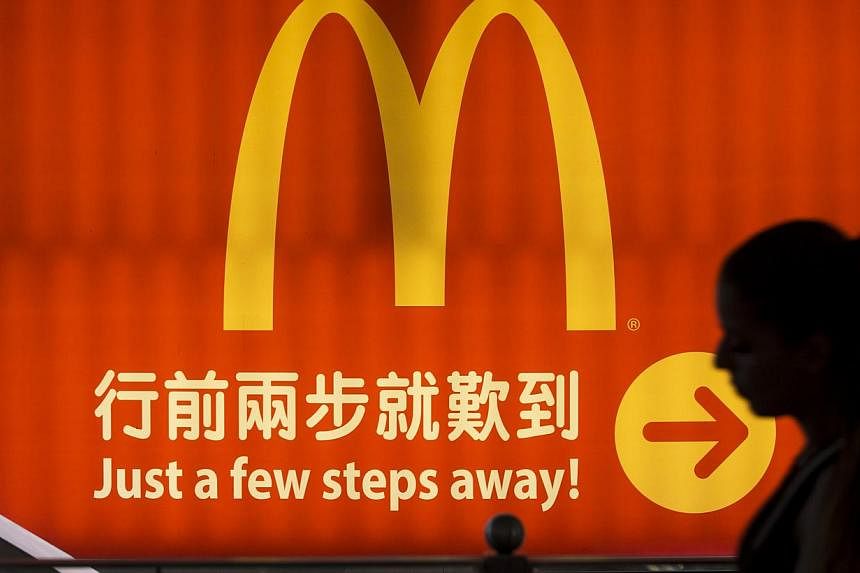 US fast food giant McDonald's has served up a super-sized order of controversy by proposing a branch in a historic building in one of China's most frequently painted landscapes, Hangzhou's West Lake. -- PHOTO: REUTERS
