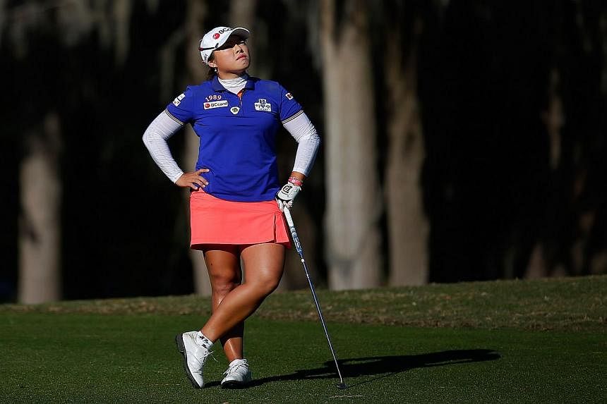 Ha-Na Jang looks on from the fairway of the 18th hole at the Coates Golf Championship on Jan 29, 2015 in Ocala, Florida. -- PHOTO: AFP
