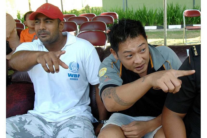 In this file photo taken on Aug 17, 2010, convicted Australian drug smugglers Myuran Sukumaran (left) and Andrew Chan (right) sit inside Kerobokan prison in Denpasar, Bali. Chan on death row in Indonesia has lost his appeal for presidential clemency,