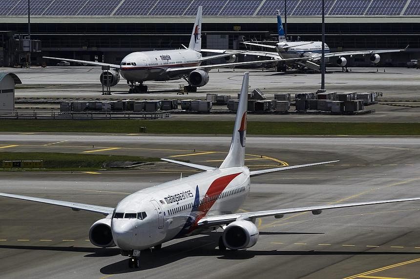 The new tracking rules, prepared by an industry working group, would be phased in by the end of this year, said the International Civil Aviation Organisation (ICAO), a United Nations agency. -- PHOTO: EPA
