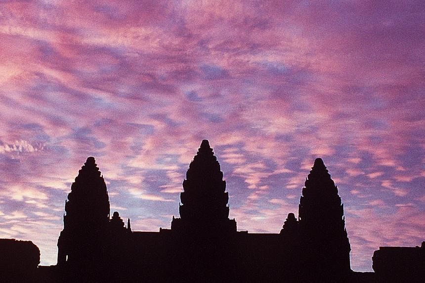 Three French tourists will be deported from Cambodia after they pleaded guilty to taking nude pictures of each other inside the country's famed Angkor temple complex, a prosecutor said on Saturday. -- ST PHOTO:&nbsp;MALCOLM MCLEOD