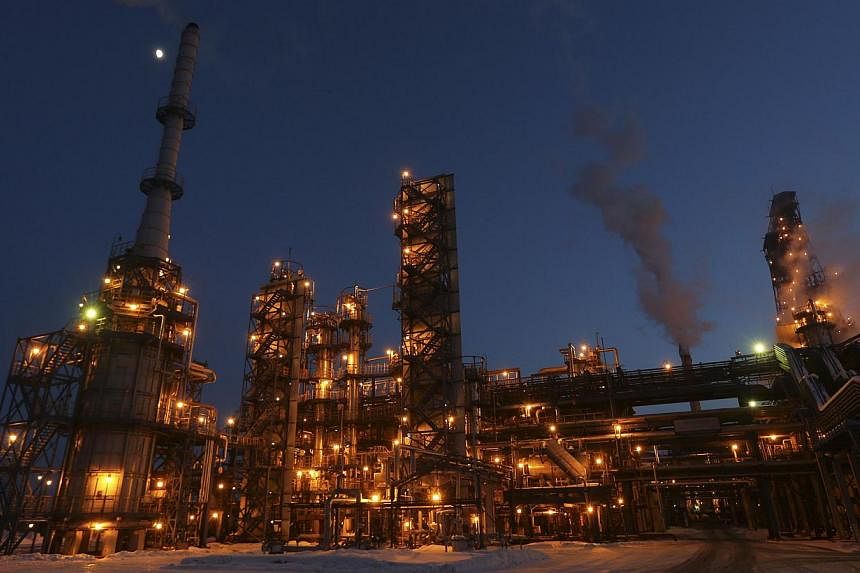 A general view of the Bashneft-Ufaneftekhim oil refinery is seen outside Ufa, Bashkortostan on Jan 29, 2015. Russian Economy Minister Alexei Ulyukayev said the ministry sees the country's economy shrinking 3 per cent in 2015 and inflation of 12 per c