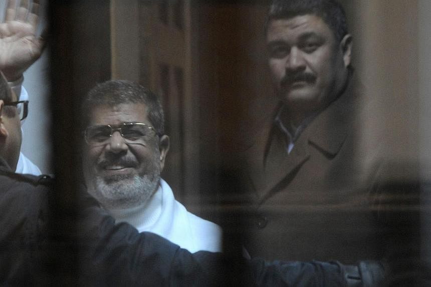 An Egyptian court set May 16 for a verdict in the espionage trial of ousted president Mohamed Morsi (above), who could be sentenced to death if convicted, an official said Saturday. -- PHOTO: AFP