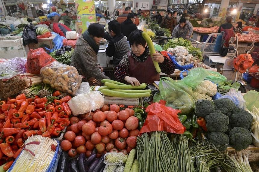 China has promised to address food safety issues and modernise its agriculture as policy priorities this year, said the nation's 2015 agenda for rural matters on Sunday, Feb 1, 2015, according to state news agency Xinhua. -- PHOTO: REUTERS
