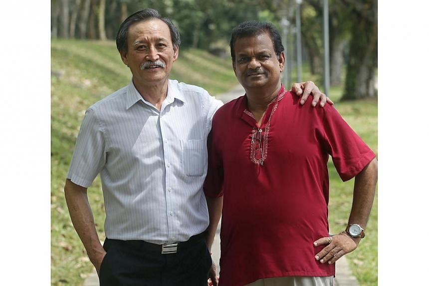 Ng Moi Song (left), 61, and Gurusamy Selvaraj (right), 58, are among the residents who was featured in the book Chronicles of Remembrance. -- ST PHOTO: SEAH KWANG PENG