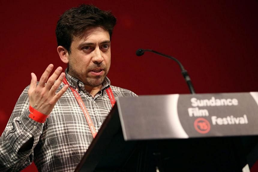 US director Alfonso Gomez-Rejon accepts the US Dramatic Grand Jury Prize for Me And Earl And The Dying Girl at the 2015 Sundance Film Festival awards night in Park City, Utah, USA on Jan 31, 2015. -- PHOTO: EPA