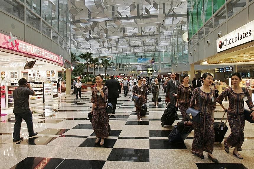 Changi Airport continued to post a steady performance in their retail business with over $2 billion registered in concession sales for 2014. -- PHOTO: ST FILE
