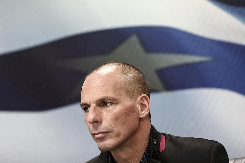 Yanis Varoufakis, Greece's incoming finance minister, pauses during the handover ceremony in Athens, Greece, on Wednesday, Jan 28, 2015. -- PHOTO: BLOOMBERG