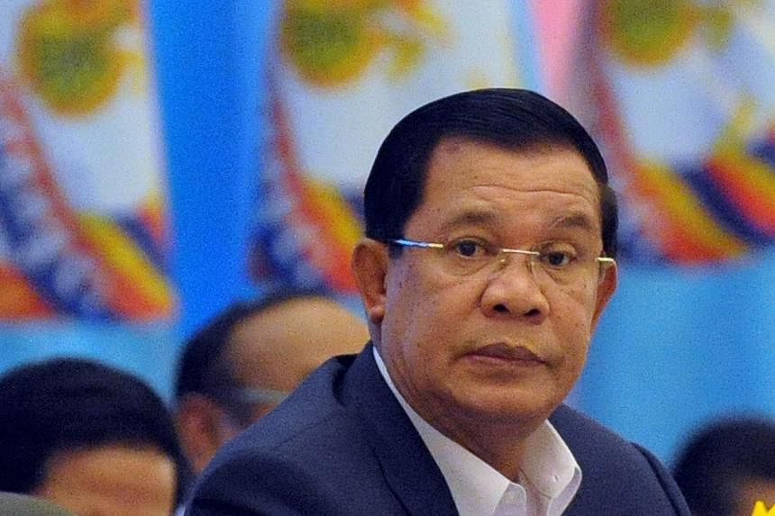 Cambodia's Prime Minister Hun Sen attends the start of the two-and-a-half-day ruling Cambodian People's Party (CCP) congress in Phnom Penh on Jan 30, 2015.&nbsp;Cambodia's ruling party named three sons of Mr Hun Sen to its upper ranks on Sunday, Feb 