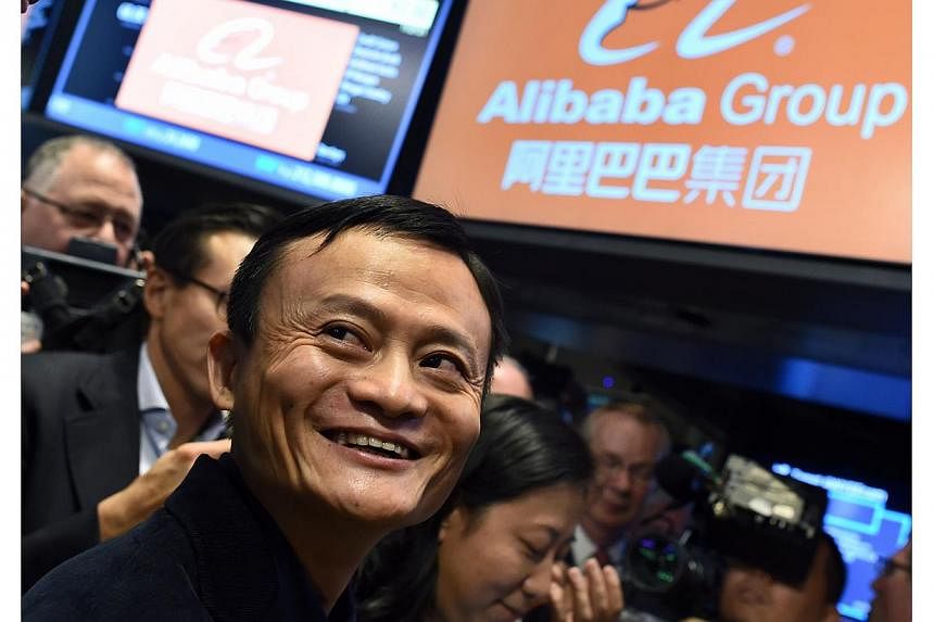 Alibaba Group Holding chairman Jack Ma regained his spot as Asia's richest person with a higher valuation for the company's finance affiliate ahead of a stock sale that also created a dozen new billionaires. -- PHOTO: AFP