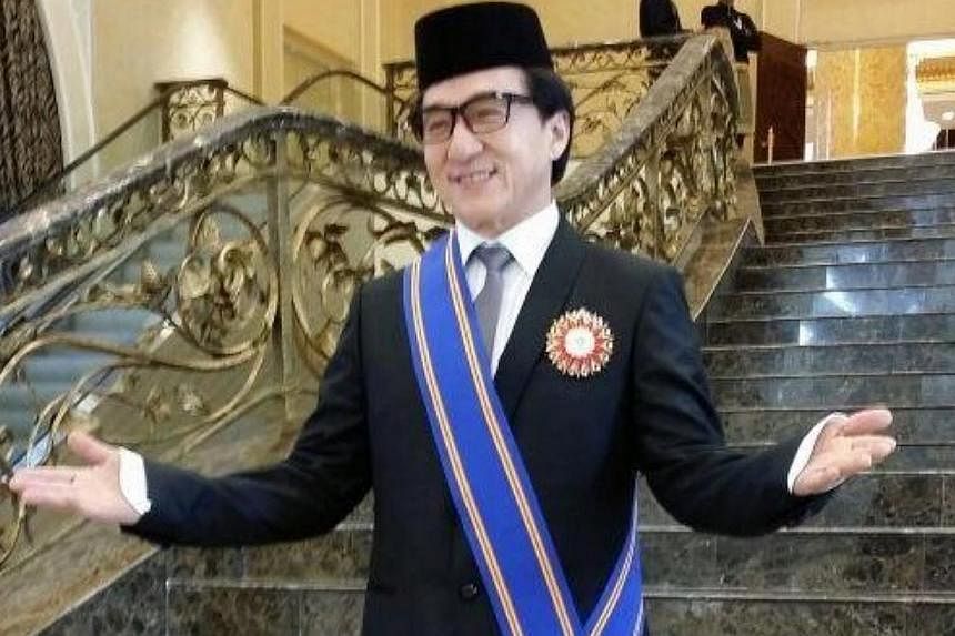 Hong Kong superstar Jackie Chan surprised many when he turned up to receive his Datukship from the King of Malaysia on Sunday, in conjunction with Federal Territory Day. -- PHOTO: TWITTER / KHAIRY JAMALUDDIN