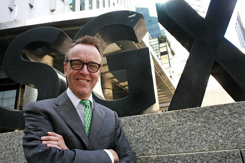 CEO of SGX Magnus Bocker poses in front of the Singapore Exchange offices in Singapore on Jan 28, 2015. SGX will hire more people in China as it seeks to sell more of its products in Asia's largest equities market. -- PHOTO: REUTERS