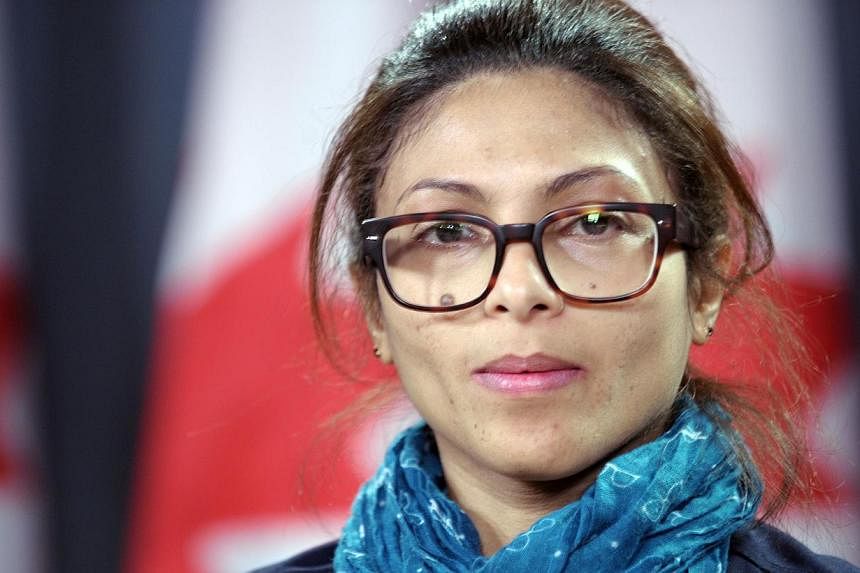 Ensaf Haidar, the wife of the Saudi Blogger Raef Badawi, holds a press conference in Ottawa, Ontario, on Thursday asking Canadian Prime minister Stephen Harper to plead on Saudi Arabia to free her husband. Badawi was flogged in public on Jan 9 near a