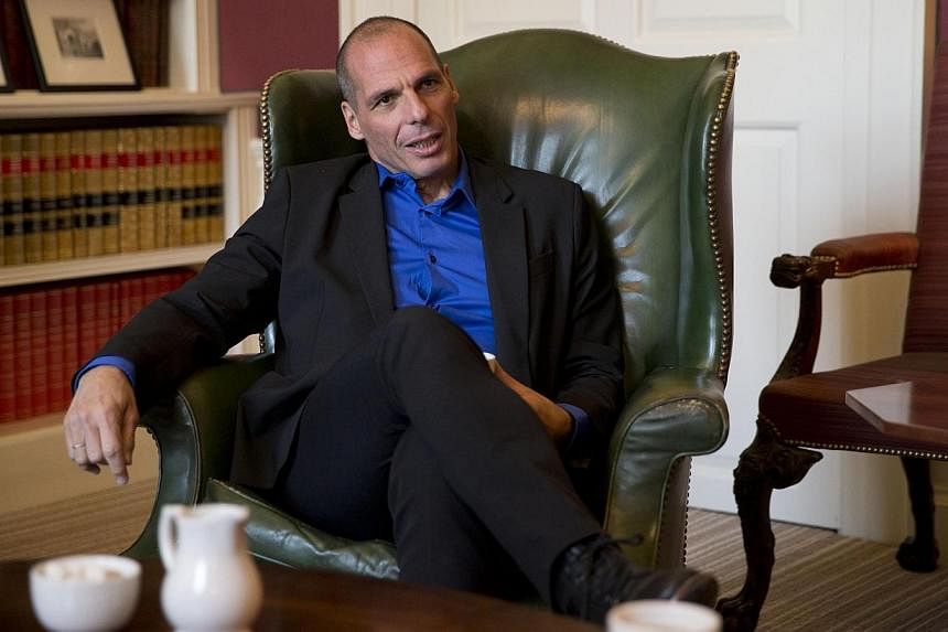 Greek Finance Minister Yanis Varoufakis speaks during his meeting with Britain's Chancellor of the Exchequer, George Osborne, at Downing Street in London on Feb 2, 2015. Mr Varoufakis is to visit the European Central Bank in Frankfurt on Feb 4, an EC