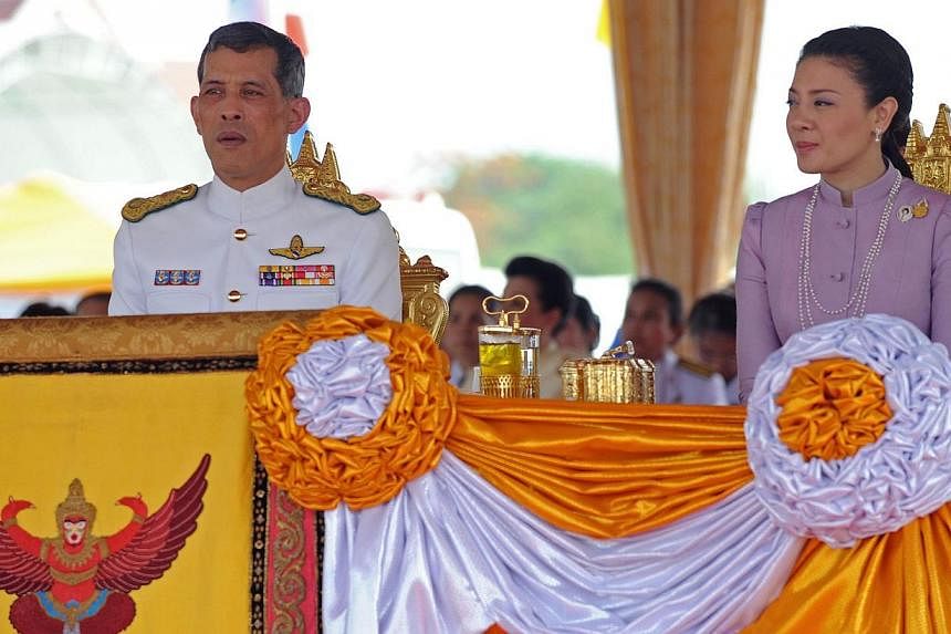 Thai Crown Prince Maha Vajiralongkorn (left) and Princess Srirasmi as they attend the annual Royal Ploughing Ceremony at Sanam Luang in Bangkok. The sister-in-law of the Crown Prince has been sentenced to two and a half years in prison, after being f