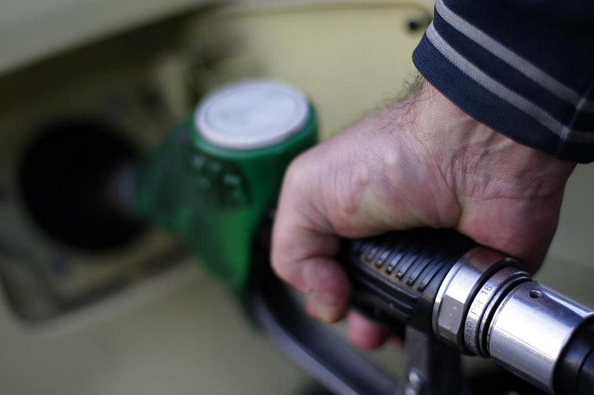 Oil is rising amid speculation that a prolonged strike will curb fuel supply in the world's biggest consumer. -- PHOTO: REUTERS